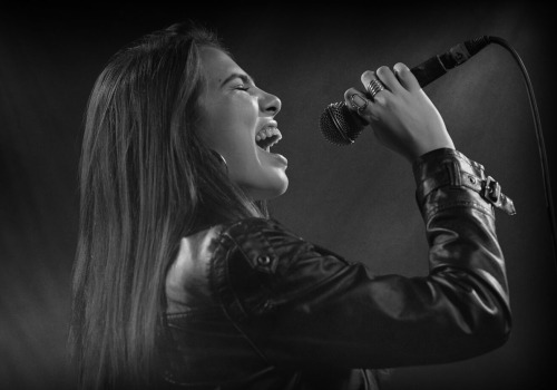 How do i become a singing teacher?